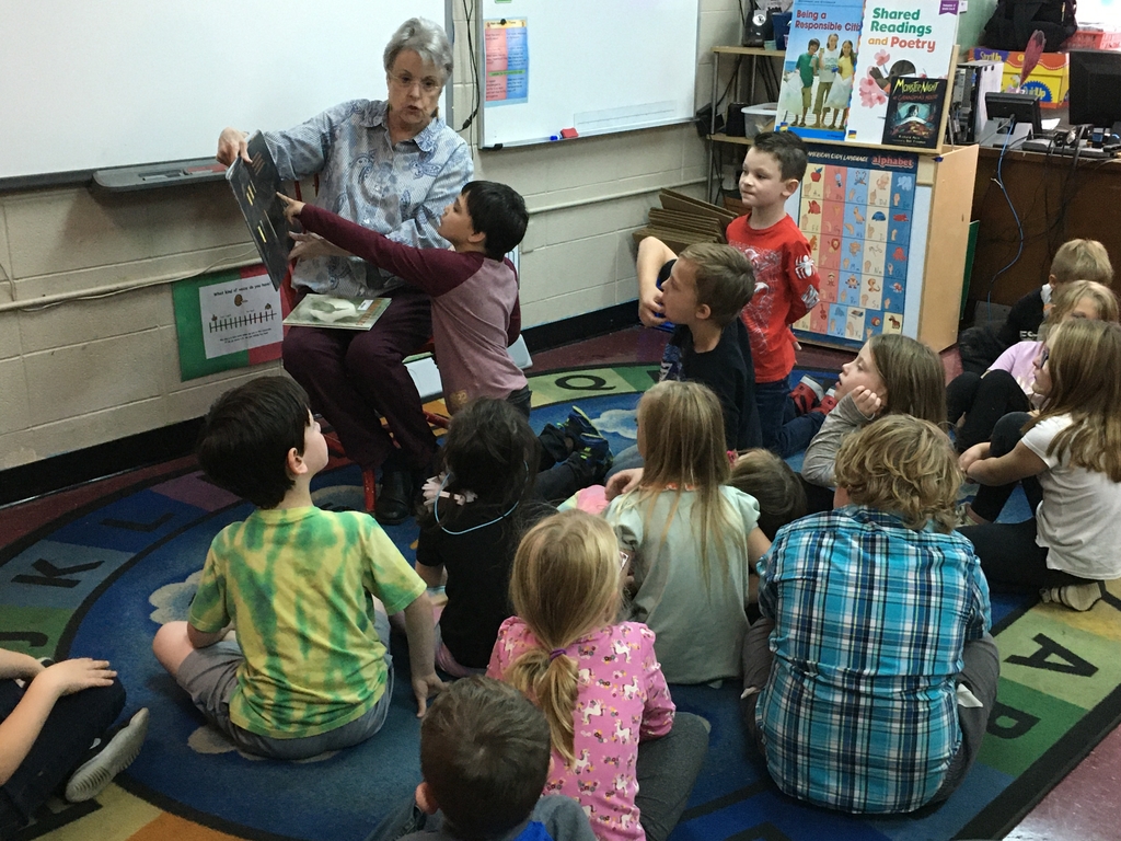 Janet Liszka reads to the first graders